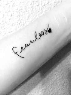 7 Fearless Tattoo Ideas Fearless Tattoo Wrist Tattoos Cursive Tattoos