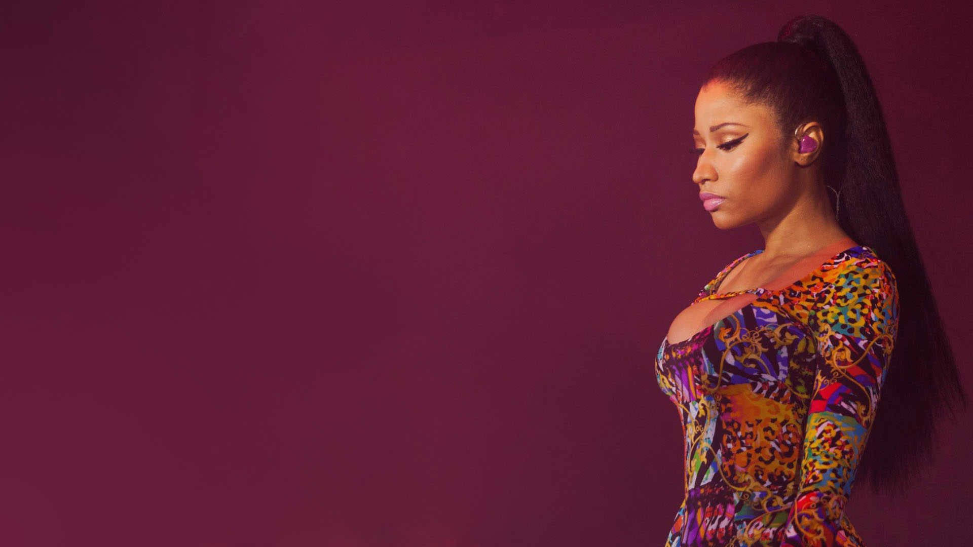 Download Nicki Minaj Stands With Confidence In A Vibrant Pink Outfit Wallpapers Com