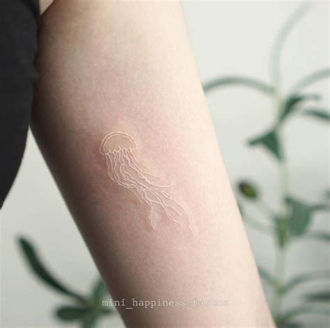 Fine Line Jellyfish Tattoo Done On The Inner Arm Fine Line Jellyfish Tattoo Done On The Inner Arm