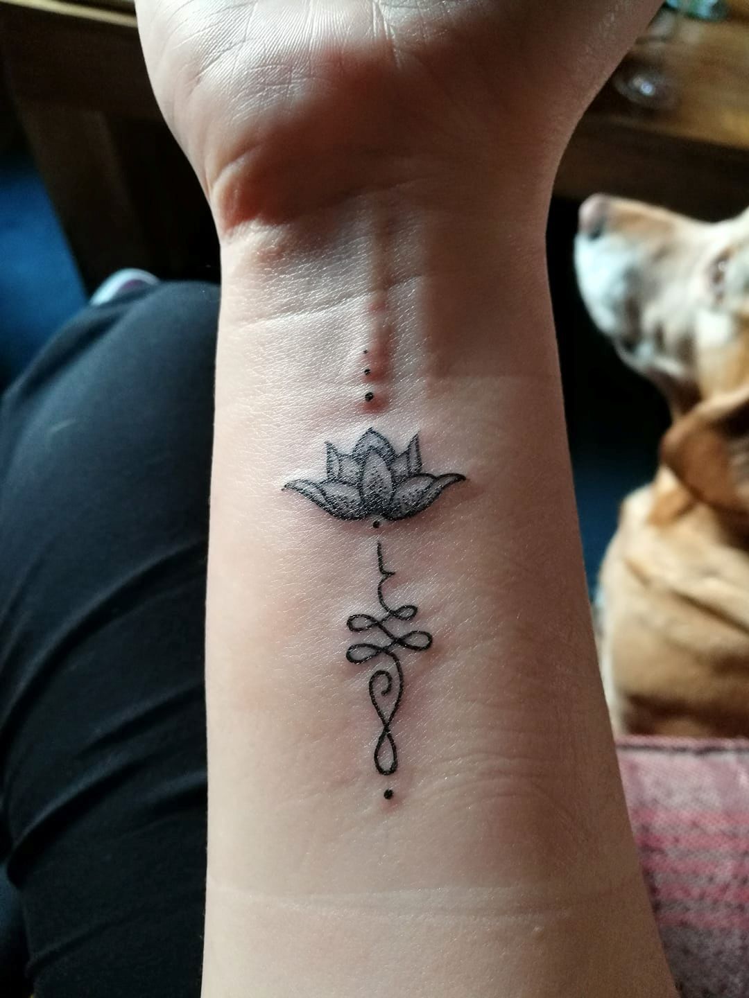 Flower On Wrist Tattoo