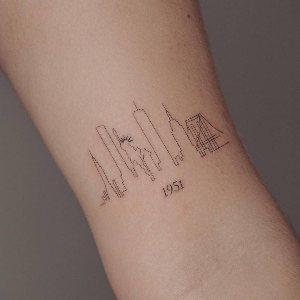 Minimalist Nyc Skyline Tattoo On The Bicep