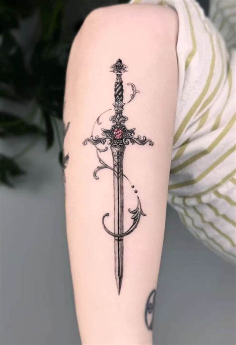Sword Tattoo Designs For Women