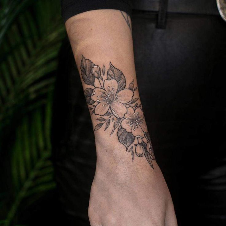 Top 37 Best Flower Wrist Tattoo Ideas 2021 Inspiration Guide Top 37 Best Flower Wrist Tattoo Ideas 2021 Inspiration Guide