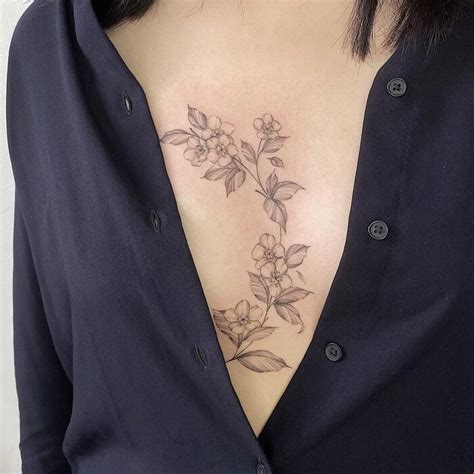 Women Sternum Tattoo