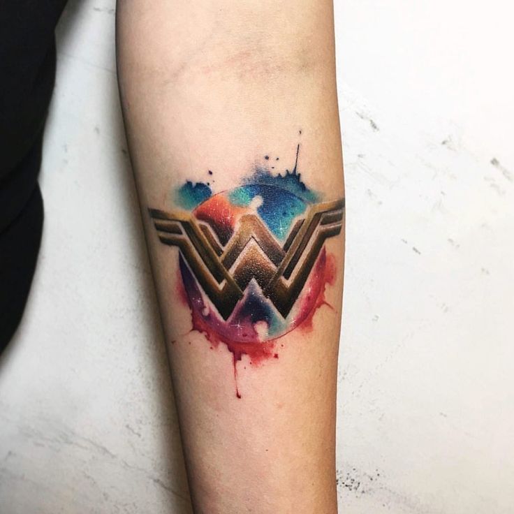 Wonder Woman Logo With Watercolor Background Whipped By Jajan Amosco